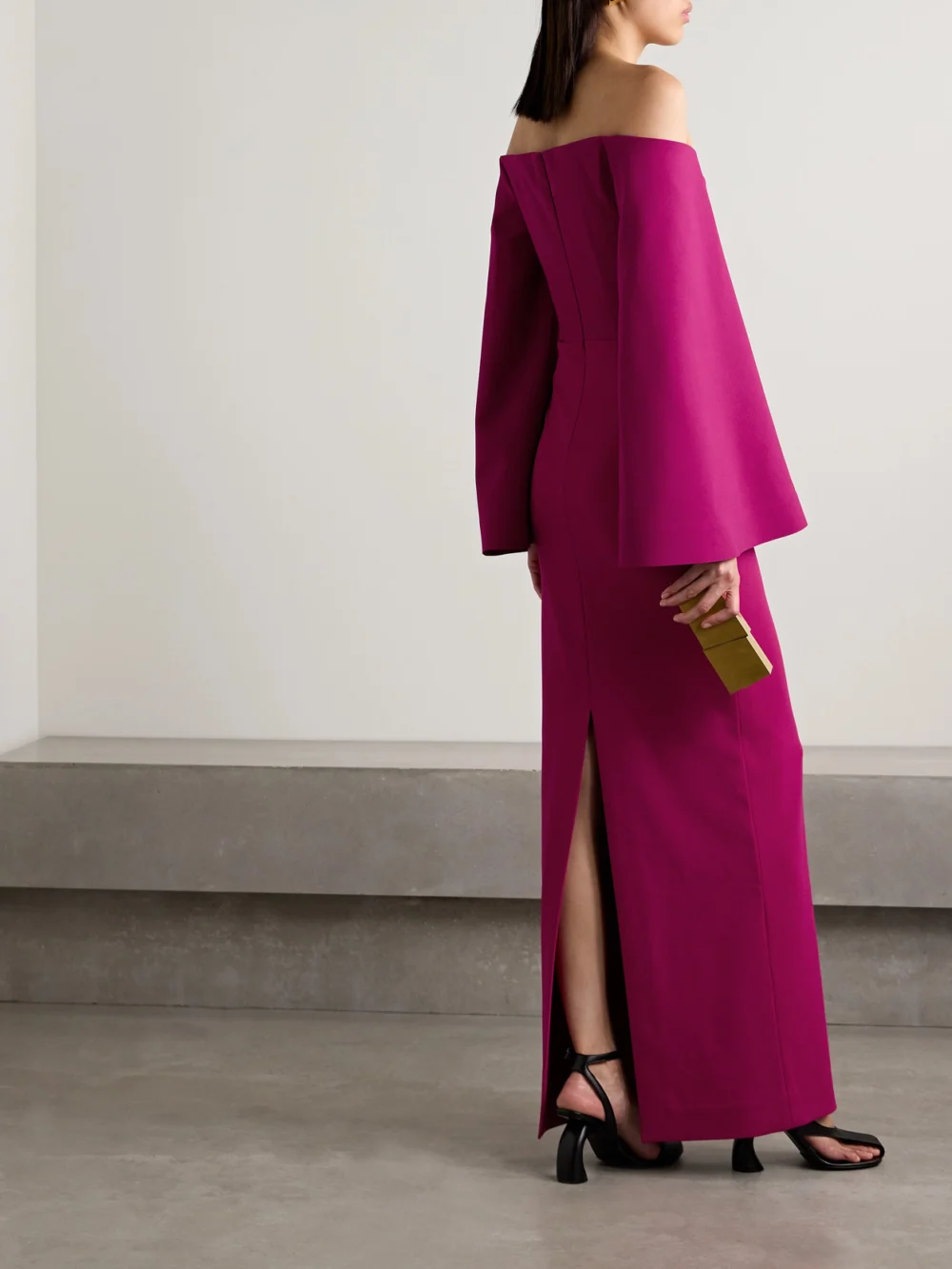 Back view of the Solace London Eliana Off-the-shoulder Draped Satin and Crepe Gown