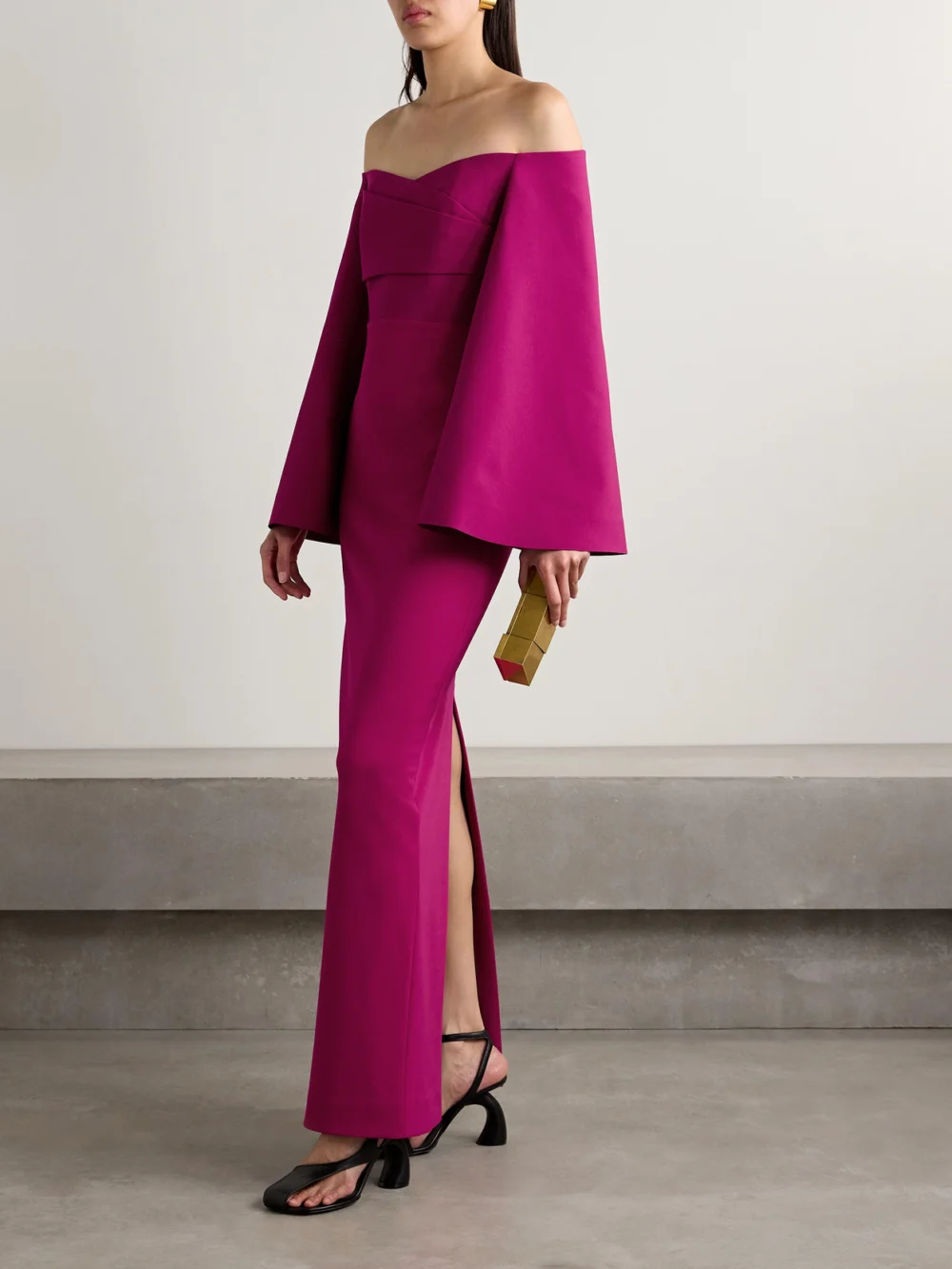 Solace London Eliana Off-the-shoulder Draped Satin and Crepe Gown, worn by a model