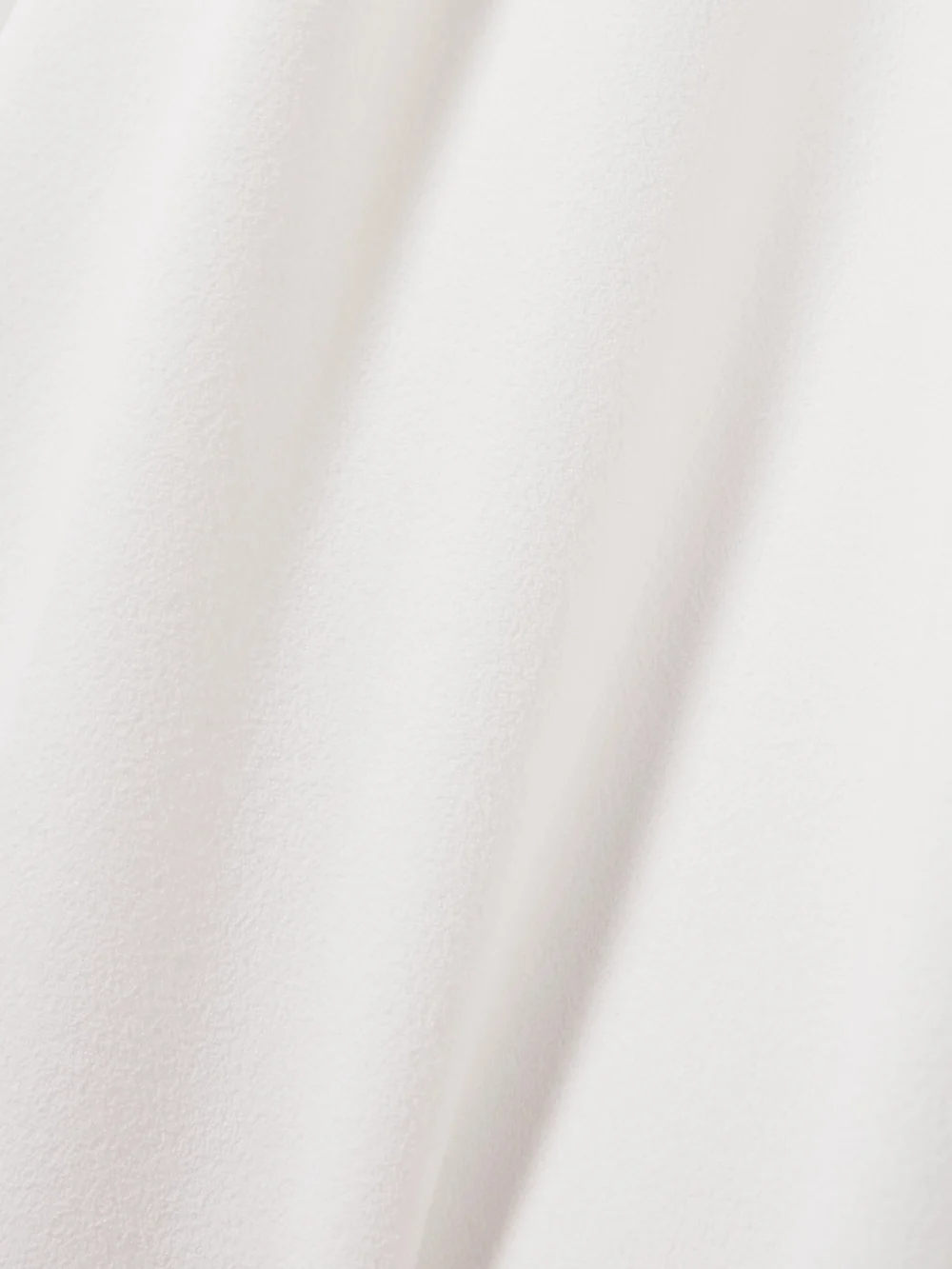 Close-up detail of the Solace London Elisa One-sleeve Crepe Gown