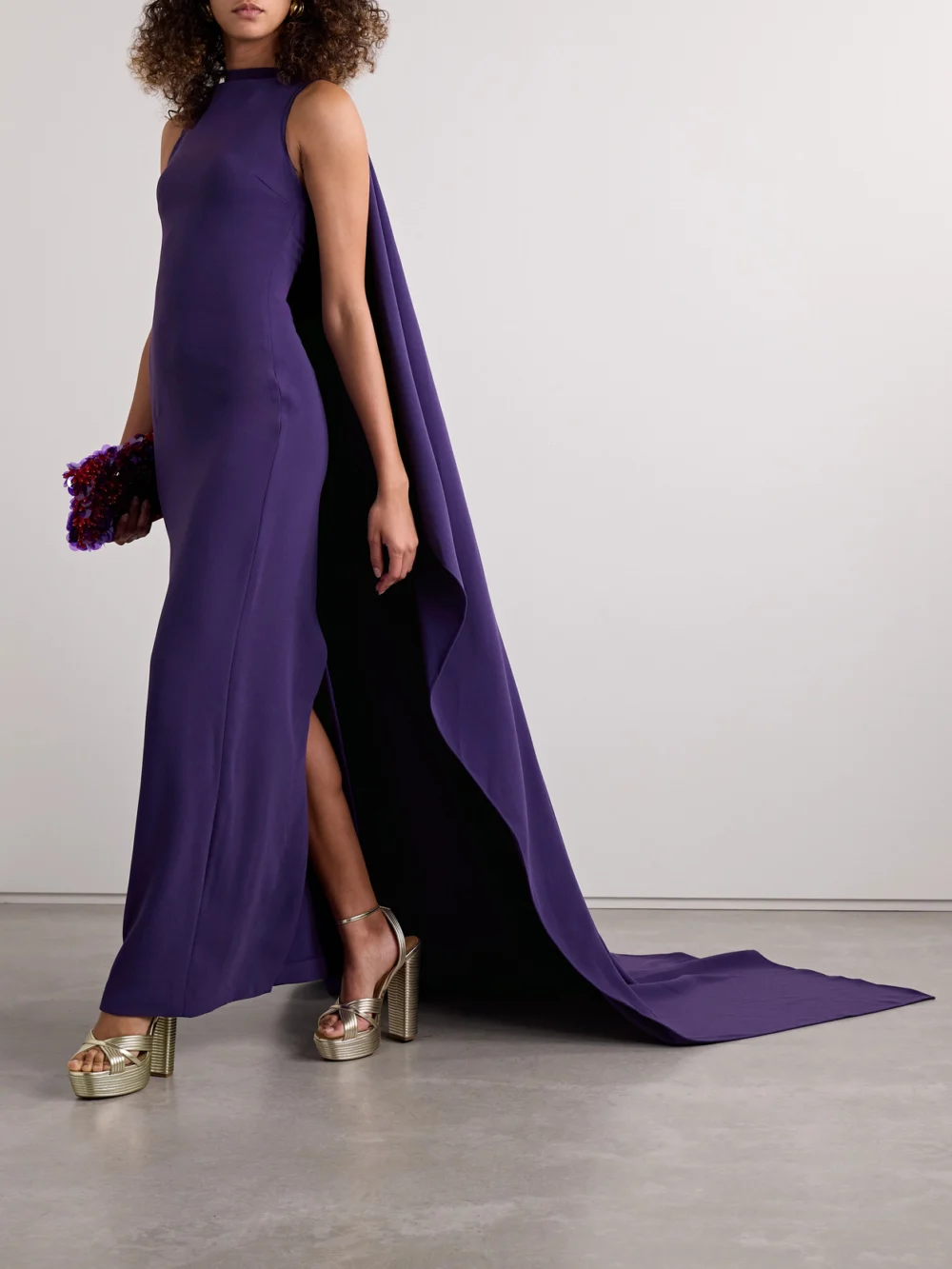 Solace London Kaila Cape-effect Crepe Gown, worn by a model