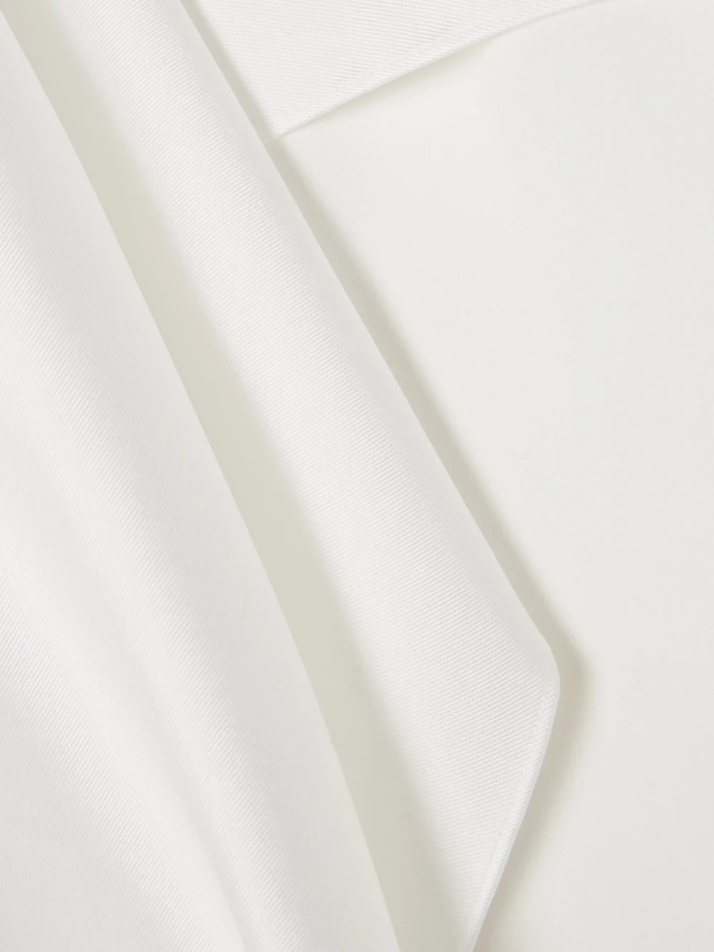 Close-up detail of the Solace London Leni Cape-effect Crepe and Faille Gown