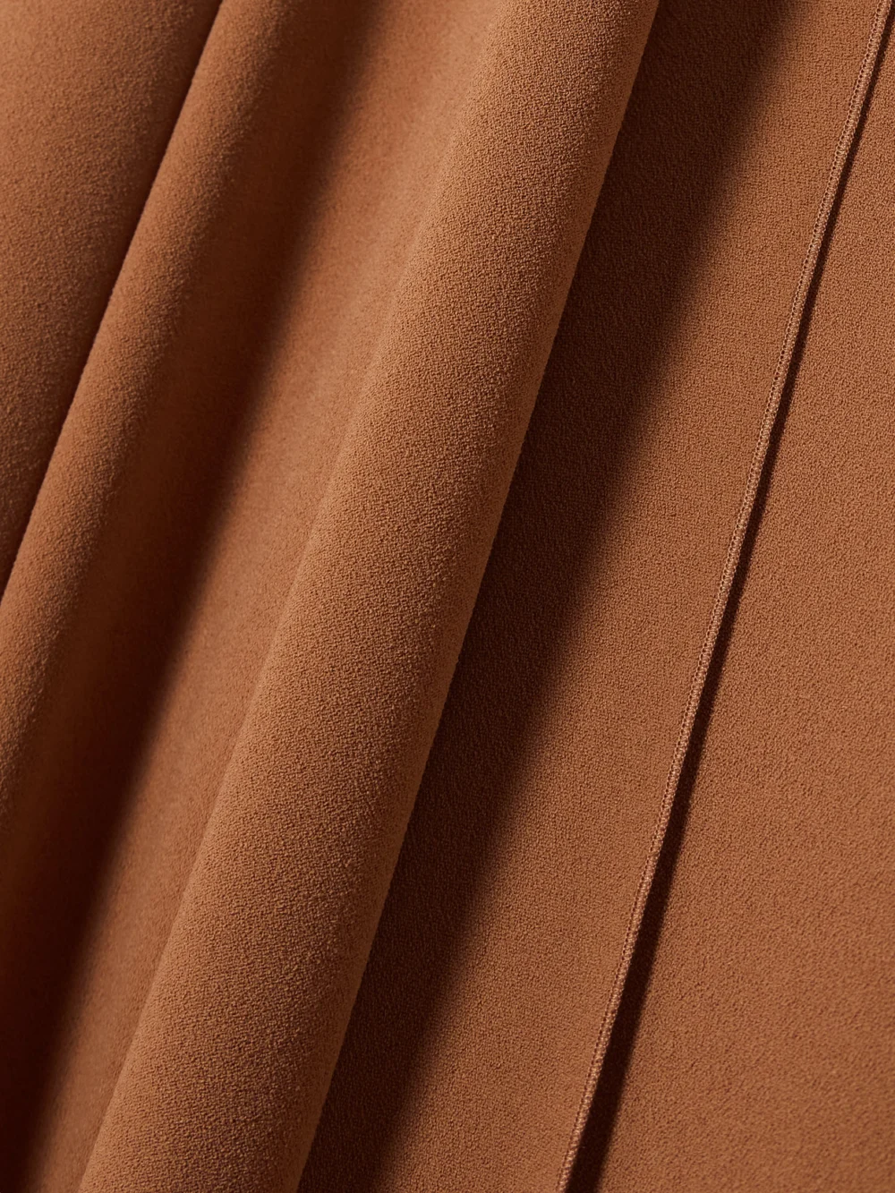 Close-up detail of the Solace London Lydia Asymmetric Draped Crepe Gown