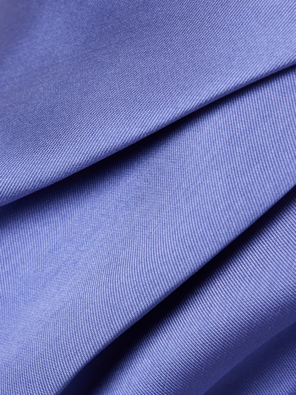 Close-up detail of the Solace London Melina Off-the-shoulder Crepe and Satin-twill Gown