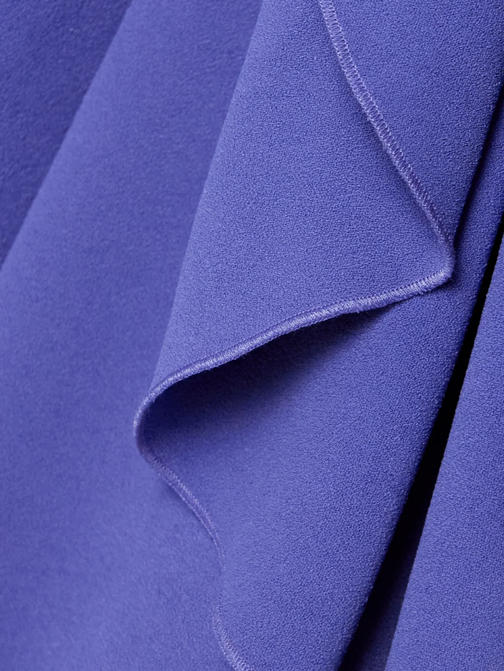 Close-up detail of the Solace London Nella Draped Ruched Crepe Maxi Dress