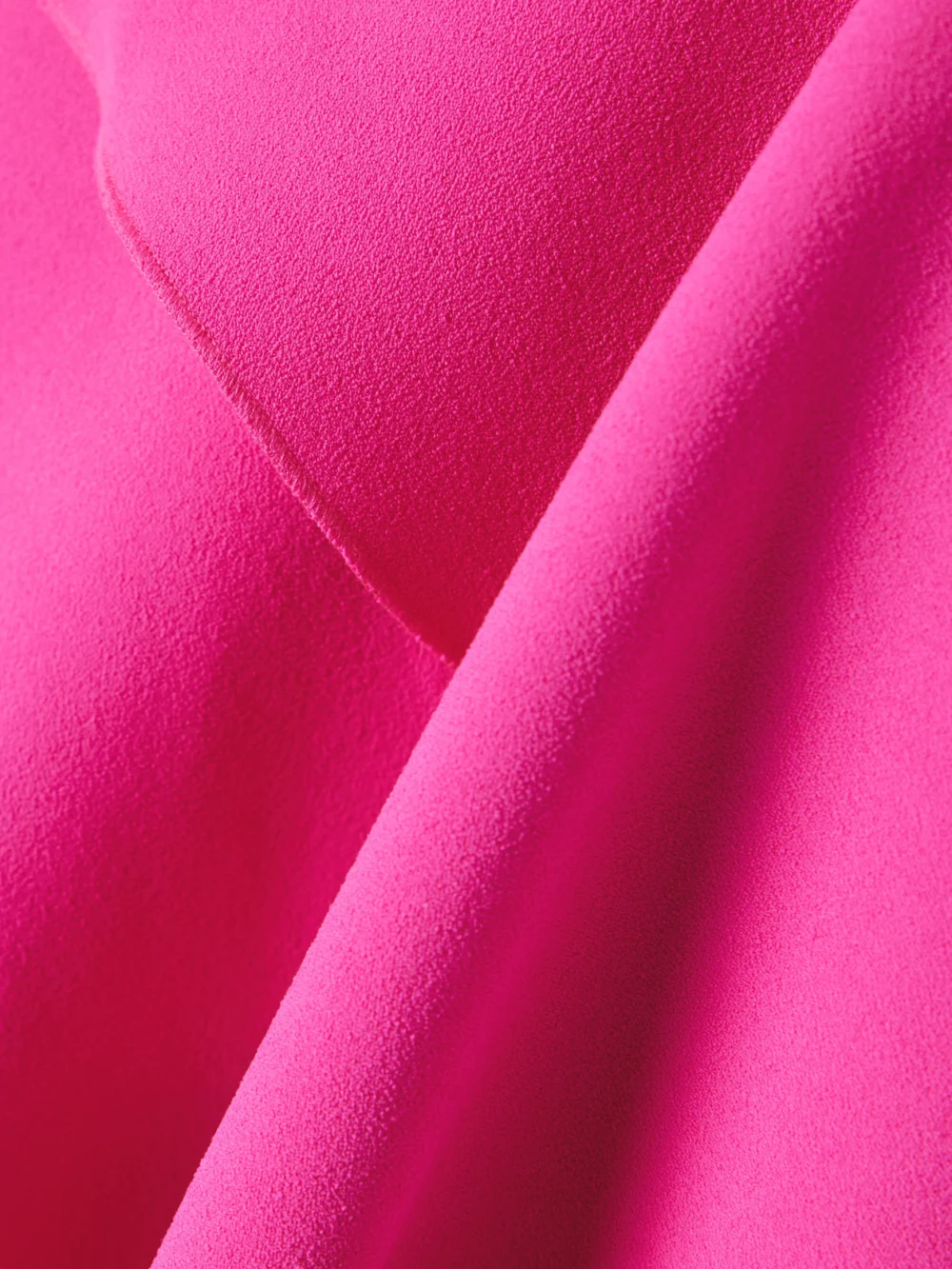 Close-up detail of the Solace London Nella Tie-neck Ruffled Crepe Gown