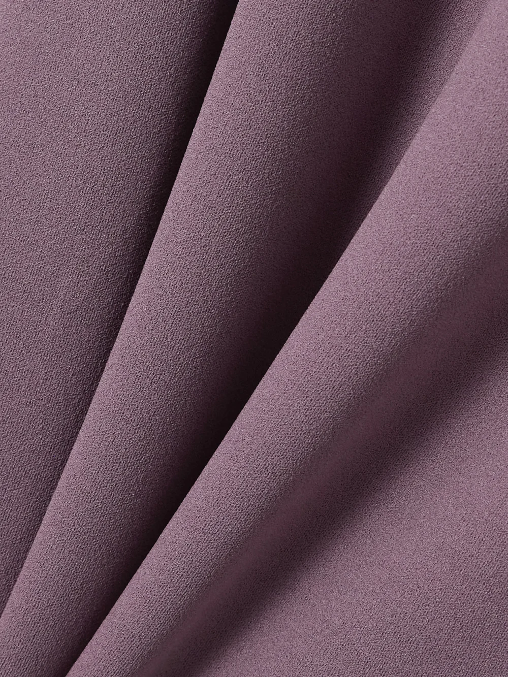 Close-up detail of the Solace London Sabina Off-the-shoulder Stretch-crepe Maxi Dress