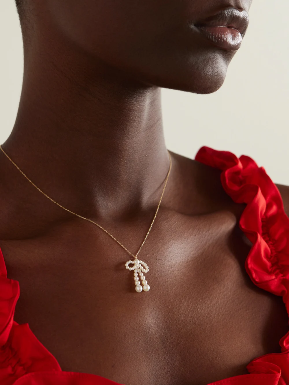 Sophie Bille Brahe Bow Simple 14-karat Recycled Gold Necklace, styled view