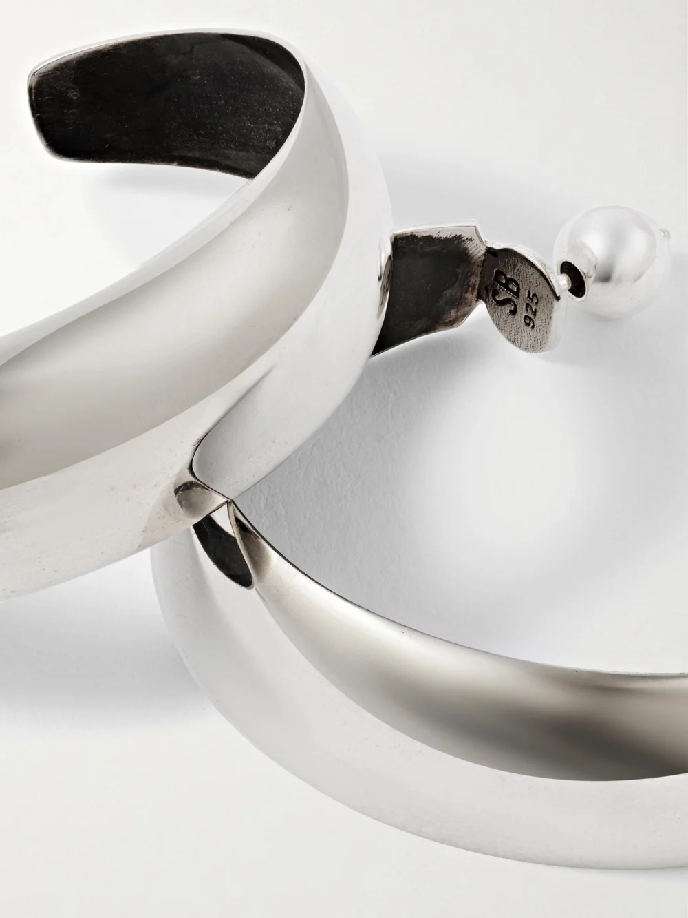 Close-up detail of the Sophie Buhai Moon Silver Hoop Earrings