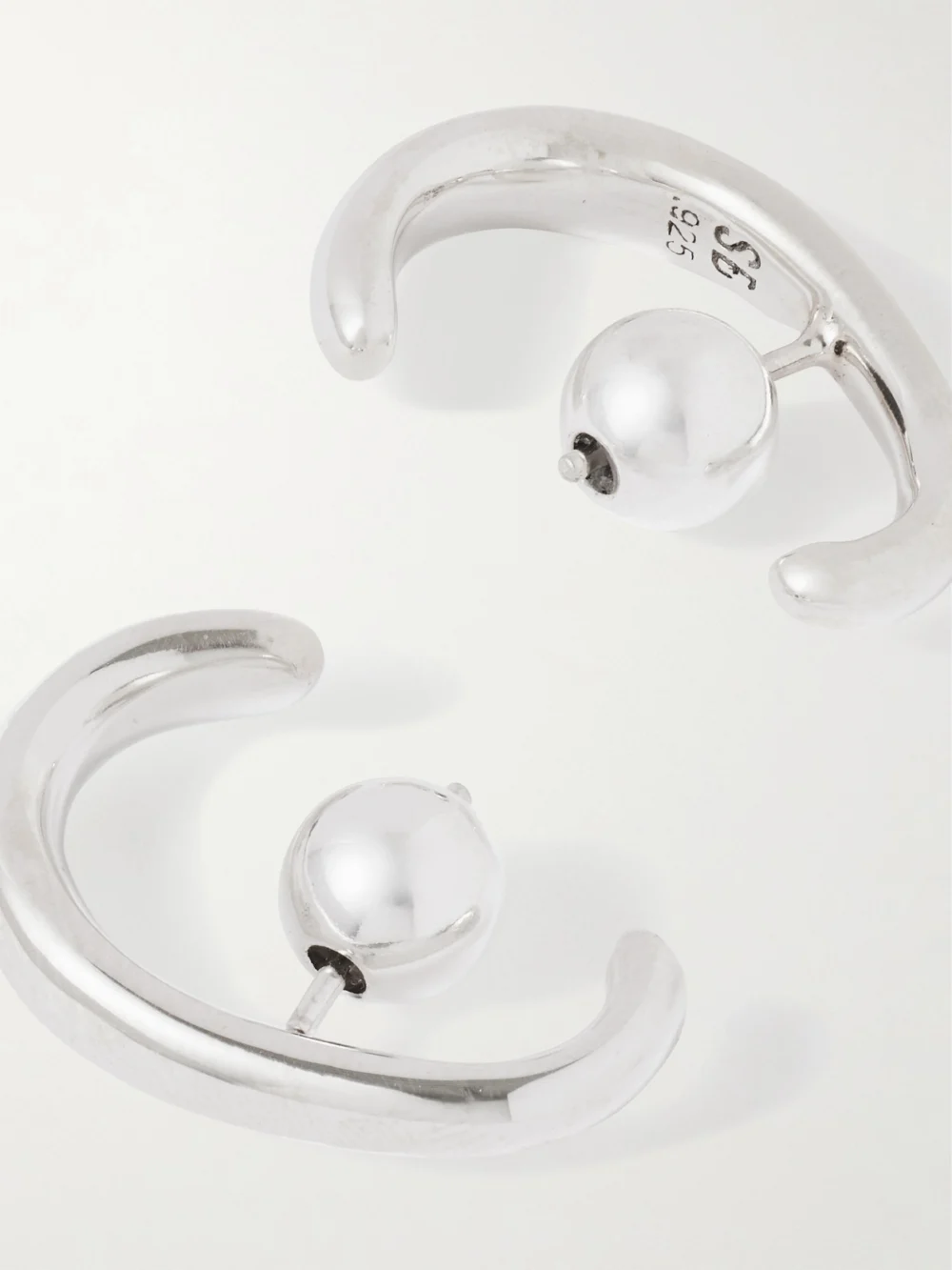 Close-up detail of the Sophie Buhai Petite Noodle Silver Hoop Earrings