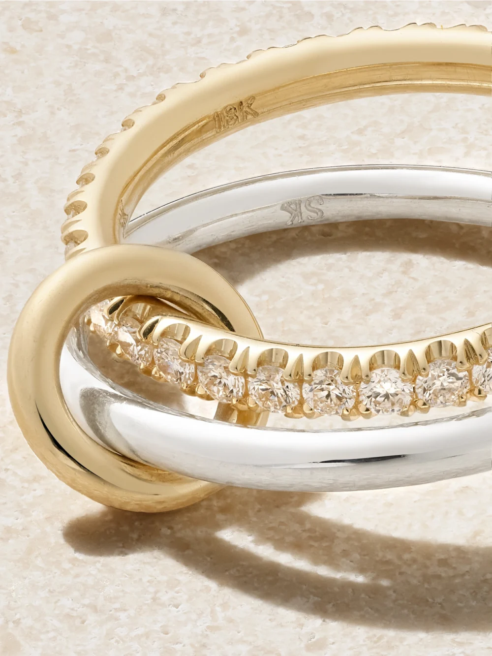 Close-up detail of the Spinelli Kilcollin Emi Set of Two 18-karat Gold and Sterling Silver Diamond Rings