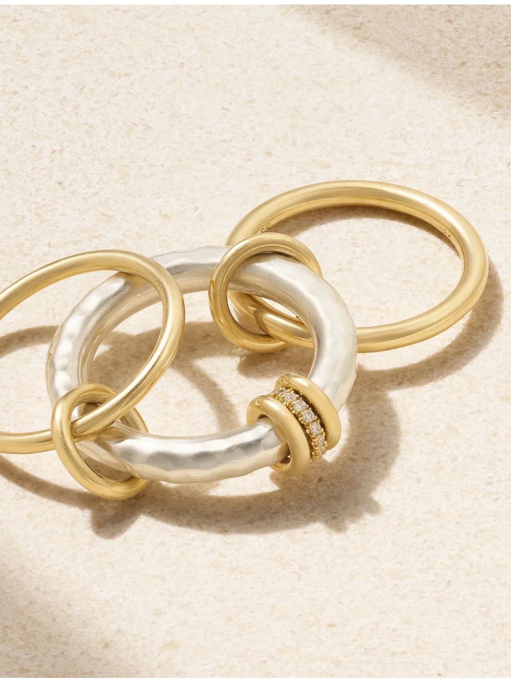 Close-up detail of the Spinelli Kilcollin Gemini Set of Three 18-karat Yellow and White Gold Diamond Rings