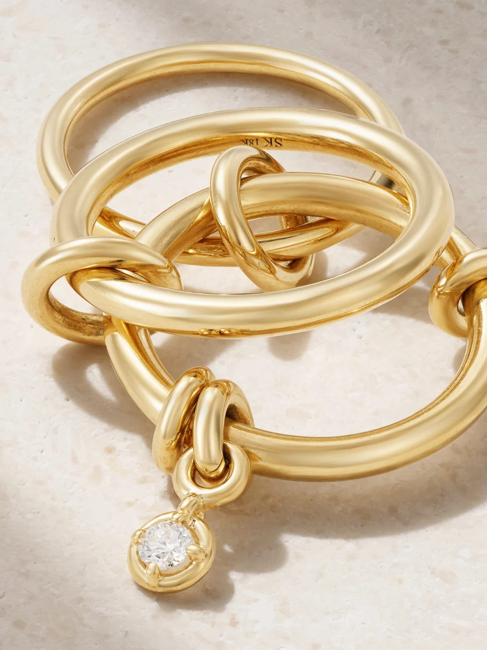 Close-up detail of the Spinelli Kilcollin Piera Set of Three 18-karat Gold Diamond Rings