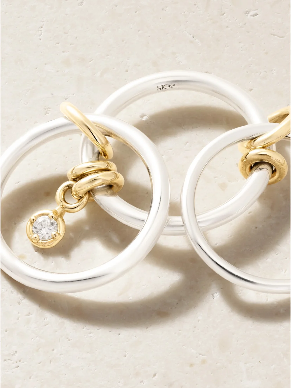 Close-up detail of the Spinelli Kilcollin Piera Set of Three 18-karat Gold, Sterling Silver and Diamond Rings