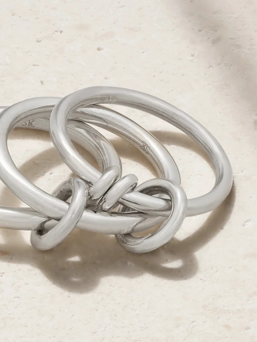 Close-up detail of the Spinelli Kilcollin Raneth Set of Three Sterling Silver Rings