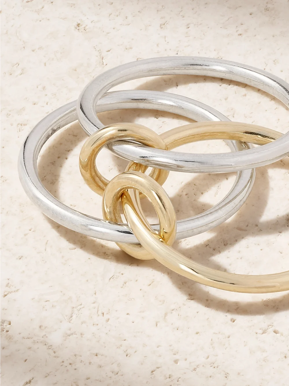Close-up detail of the Spinelli Kilcollin Solarium Set of Three 18-karat Gold and Sterling Silver Rings