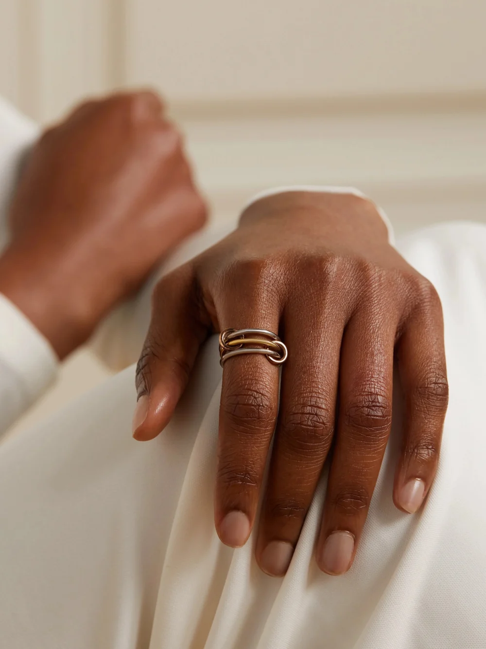 Spinelli Kilcollin Solarium Set of Three 18-karat Yellow and Rose Gold and Sterling Silver Rings, styled view
