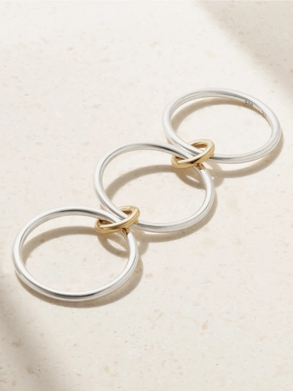 Back view of the Spinelli Kilcollin Solarium Set of Three Sterling Silver and 18-karat Gold Rings