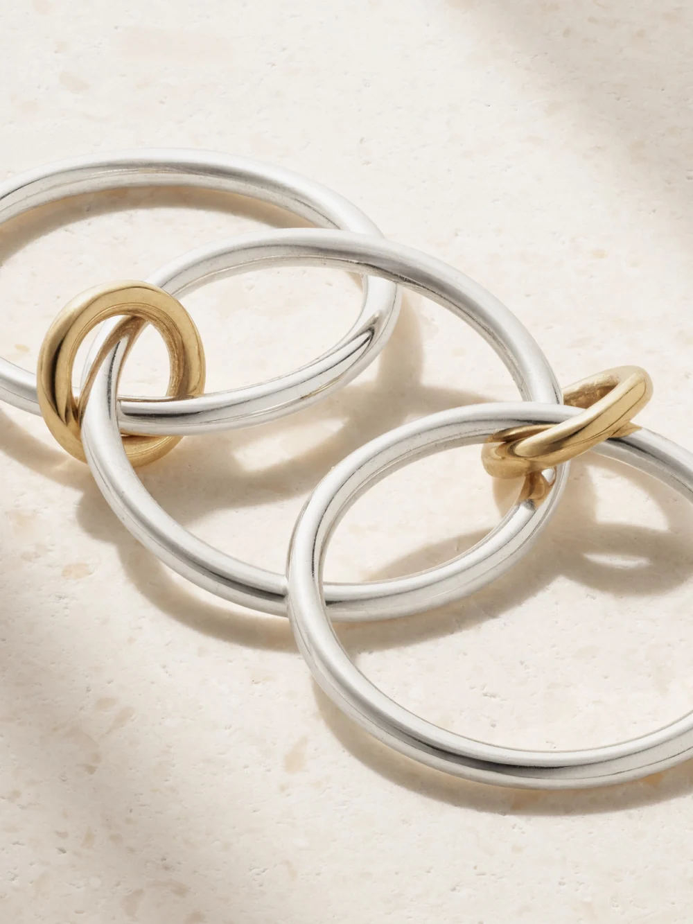 Close-up detail of the Spinelli Kilcollin Solarium Set of Three Sterling Silver and 18-karat Gold Rings