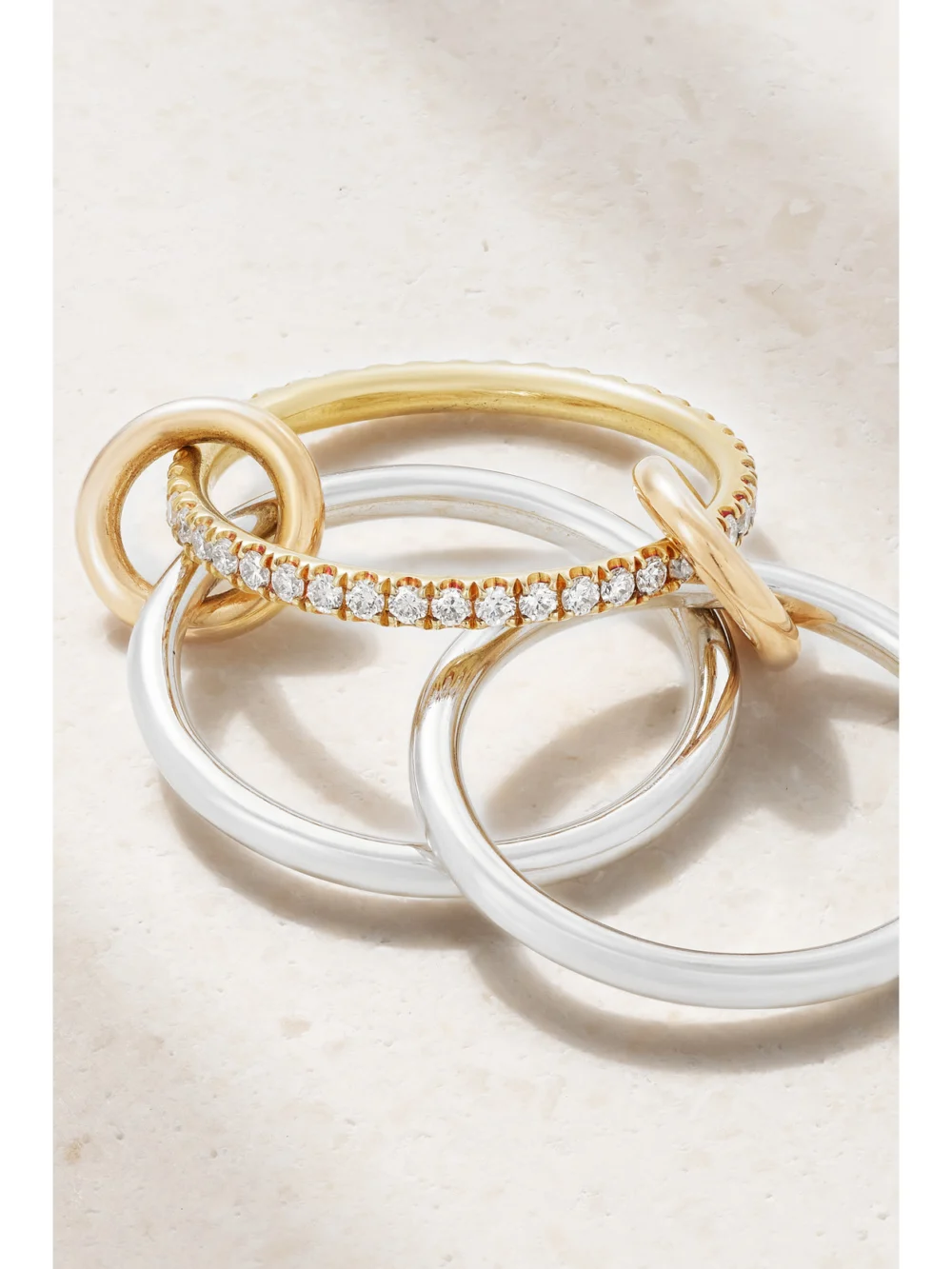 Close-up detail of the Spinelli Kilcollin Sonny Set of Three 18-karat White, Yellow and Rose Gold Diamond Rings