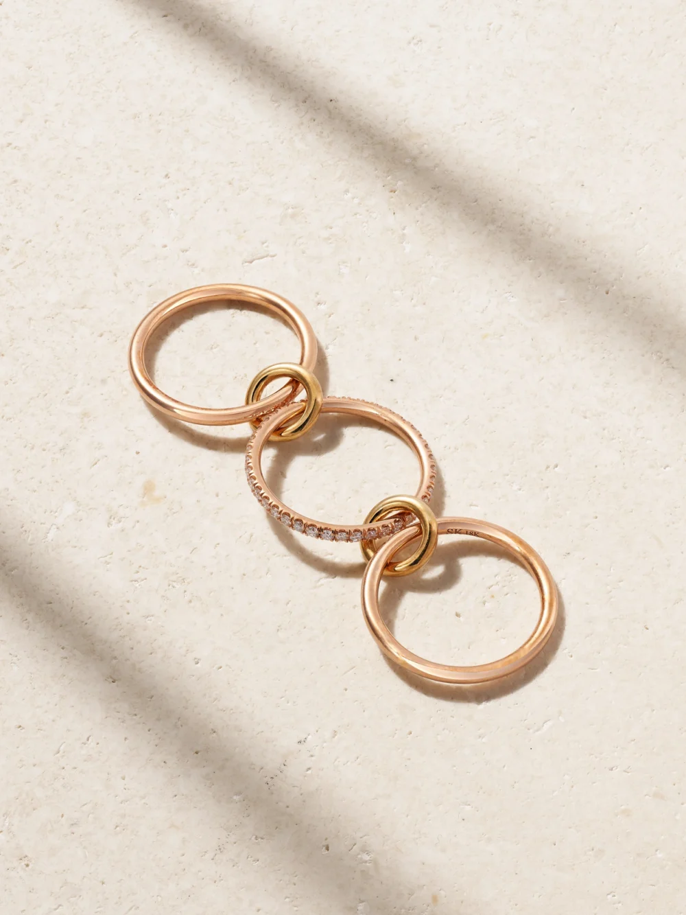 Back view of the Spinelli Kilcollin Sonny Set of Three 18-karat Yellow and Rose Gold and Diamond Rings