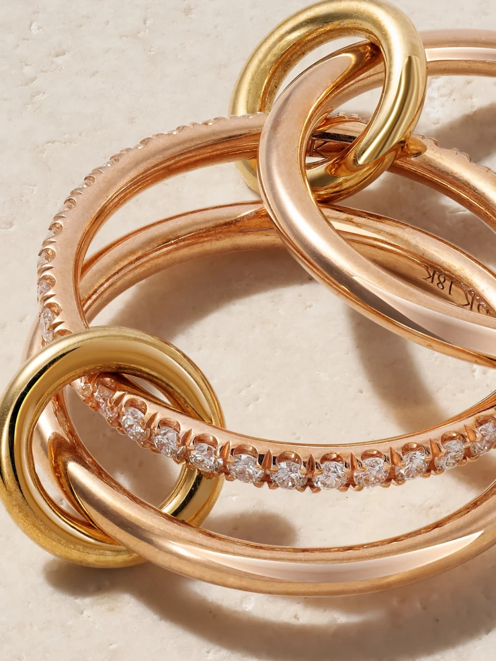 Close-up detail of the Spinelli Kilcollin Sonny Set of Three 18-karat Yellow and Rose Gold and Diamond Rings