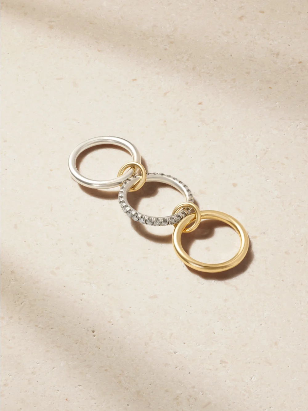 Back view of the Spinelli Kilcollin Taurus Set of Three 18-karat Gold and Sterling Silver Diamond Rings