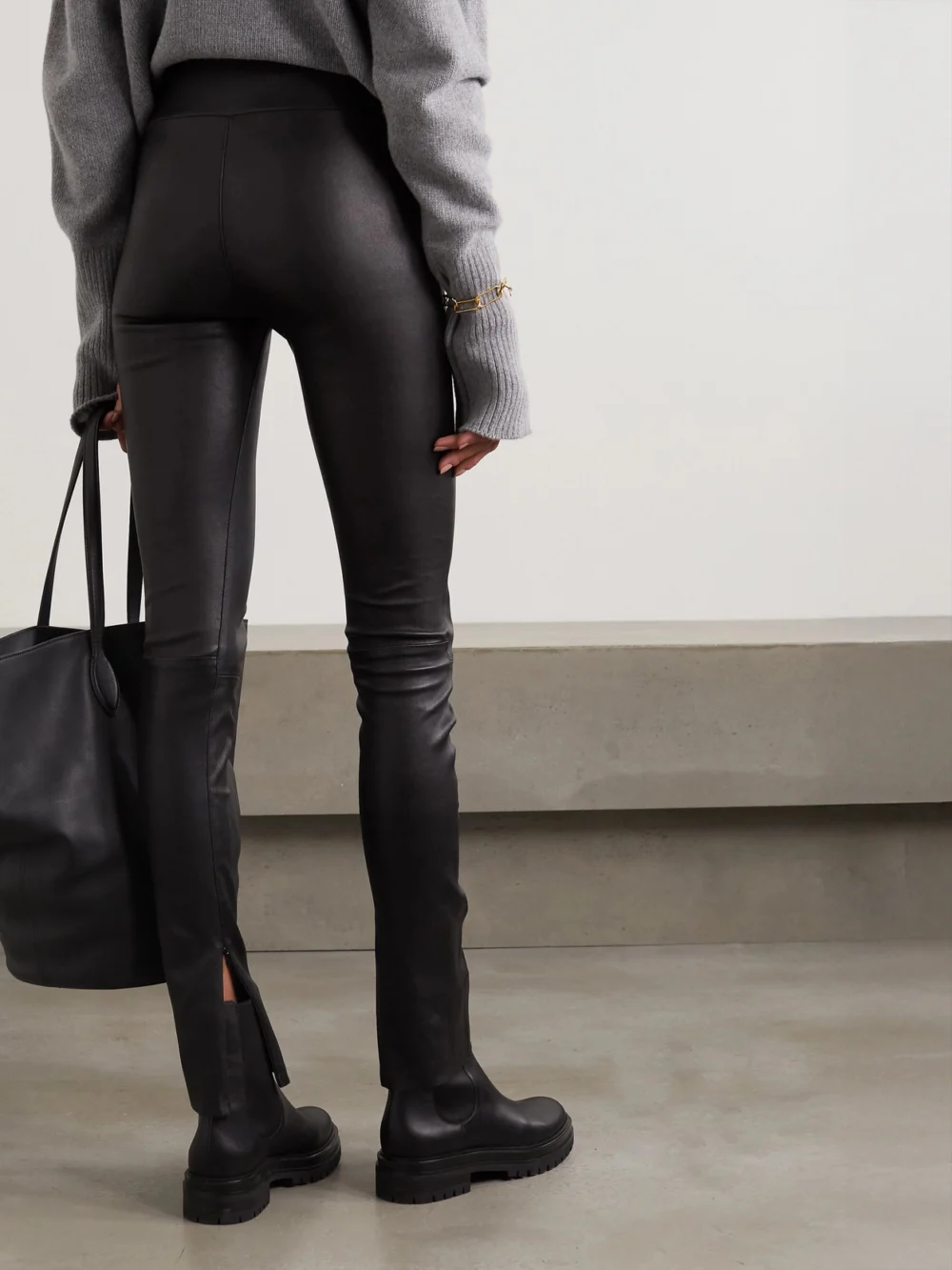 Back view of the Sprwmn Zip-detailed Leather Leggings