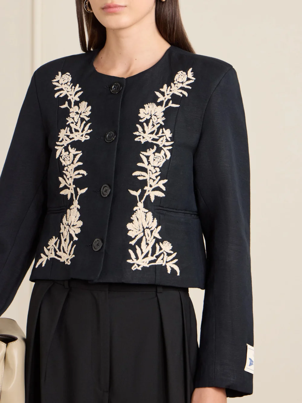 Close-up detail of the S.S. Daley Ophelia Cropped Embroidered Woven Jacket