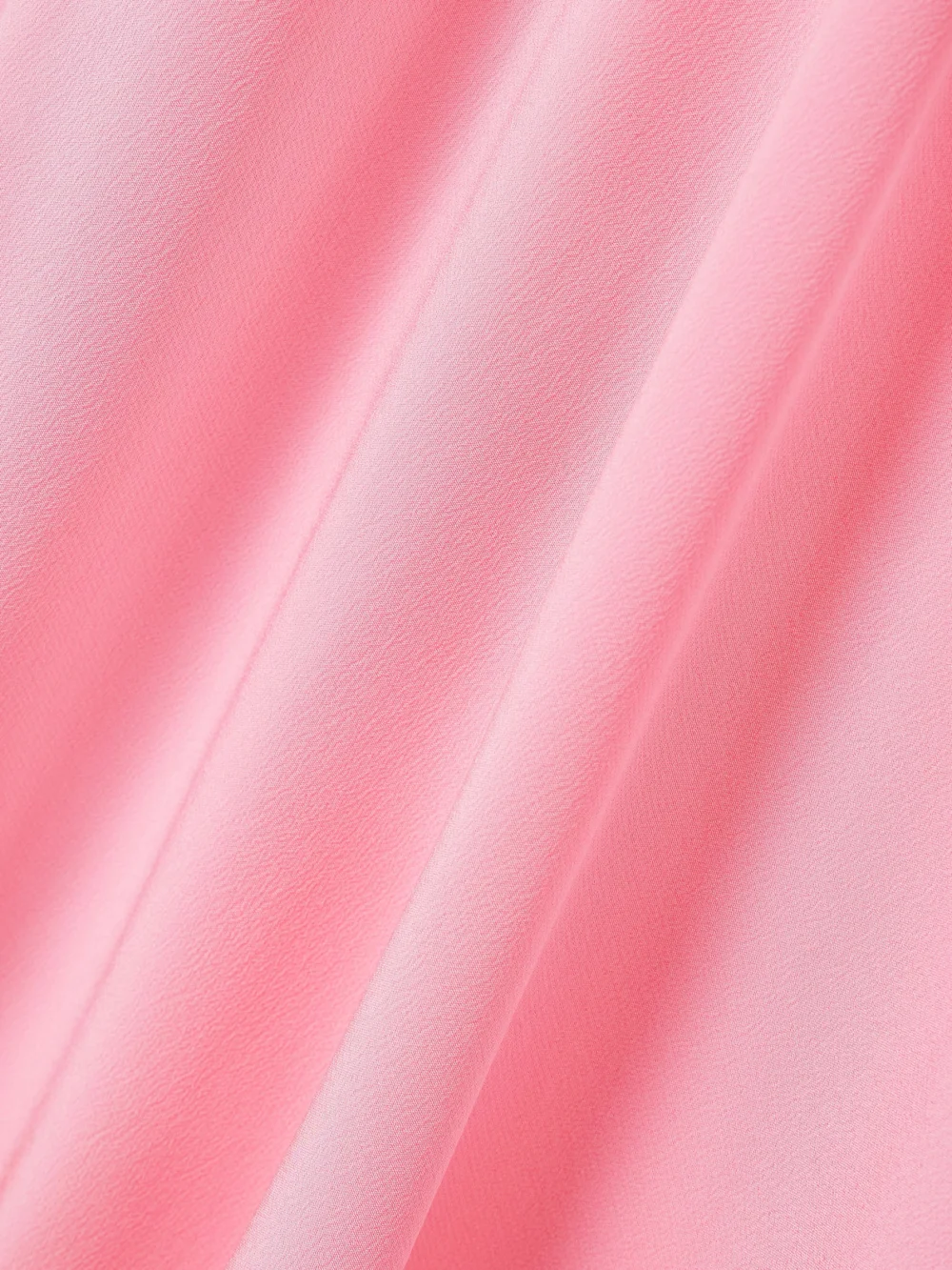 Close-up detail of the Stella McCartney Asymmetric Draped Silk-crepe Midi Dress