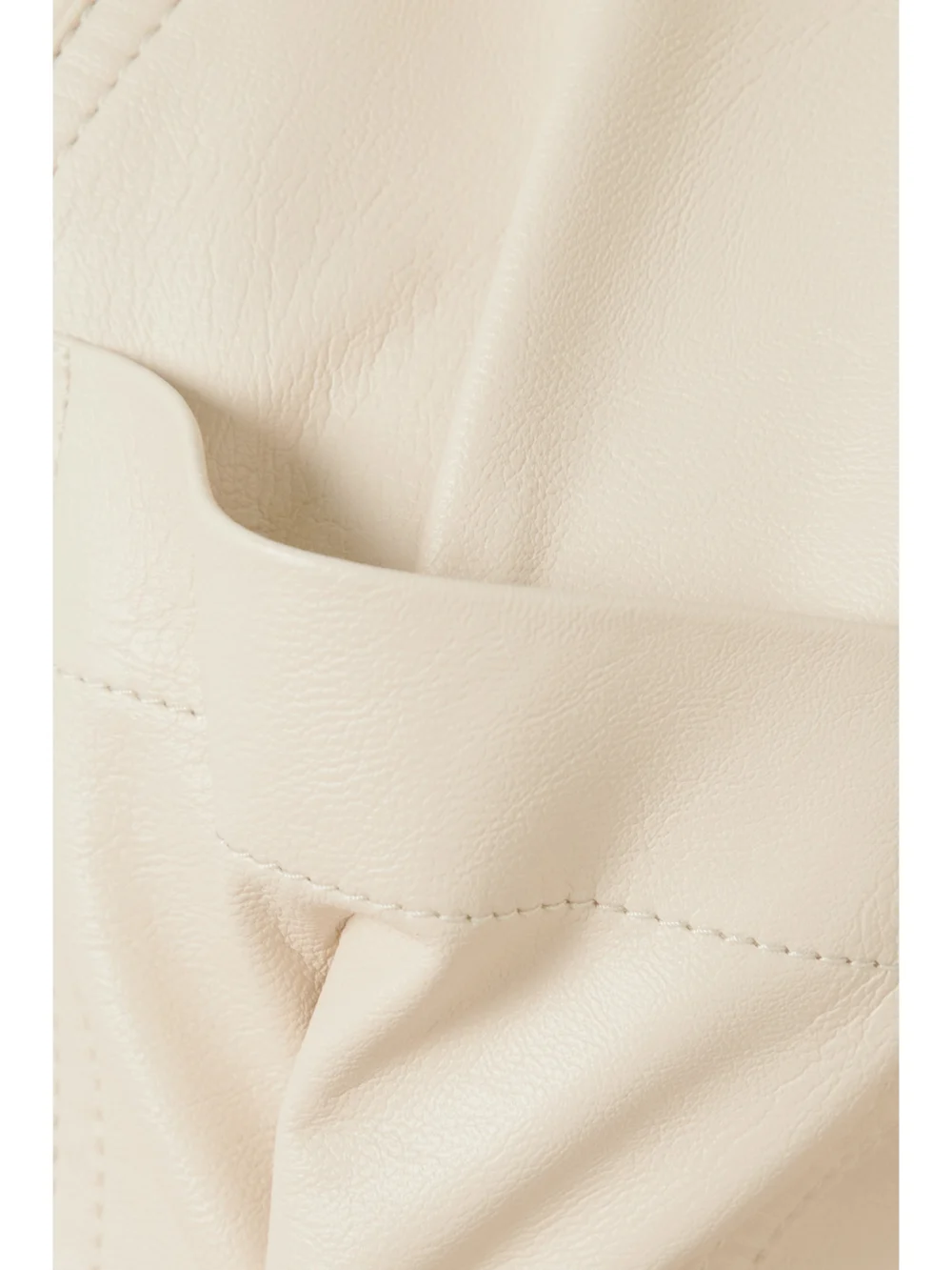 Close-up detail of the Stella McCartney Cropped Belted Vegetarian Fabric Jumpsuit