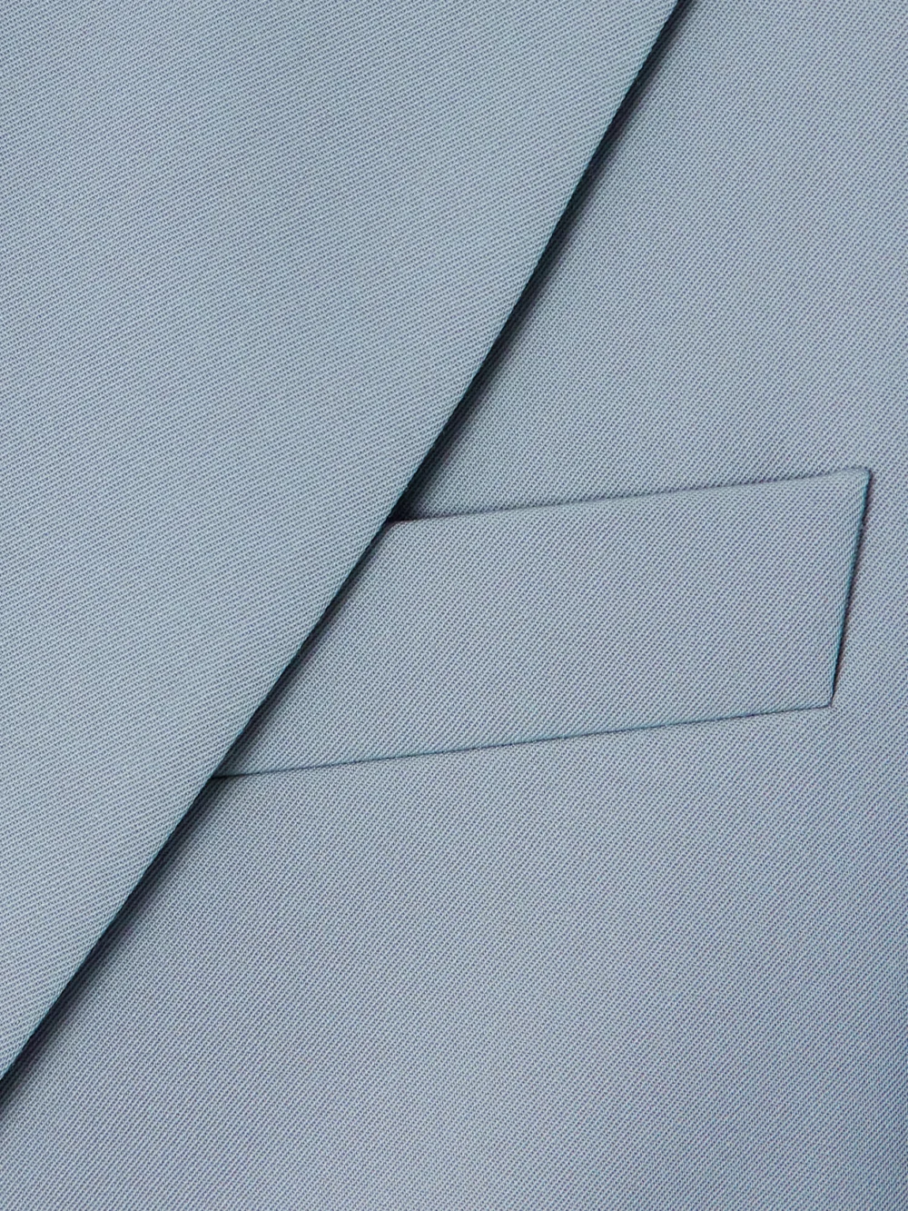 Close-up detail of the Stella McCartney Cropped Grain De Poudre Wool-blend Blazer