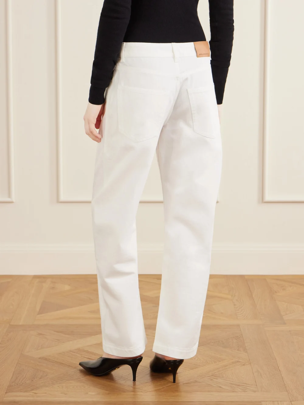 Back view of the Stella McCartney Cropped High-rise Barrel-leg Jeans