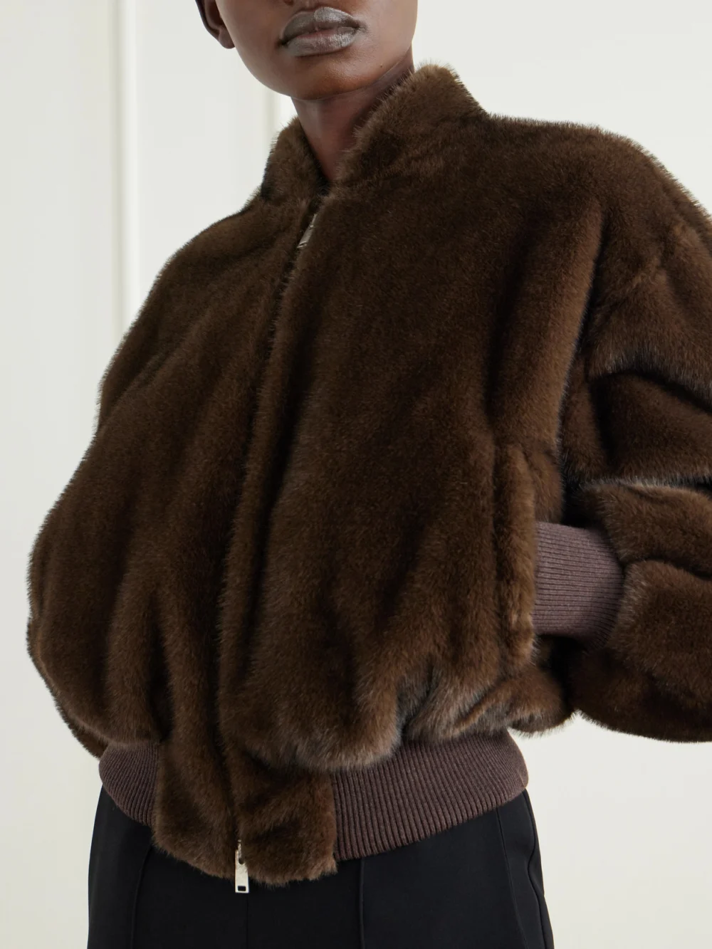 Close-up detail of the Stella McCartney Cropped Plush Bomber Jacket