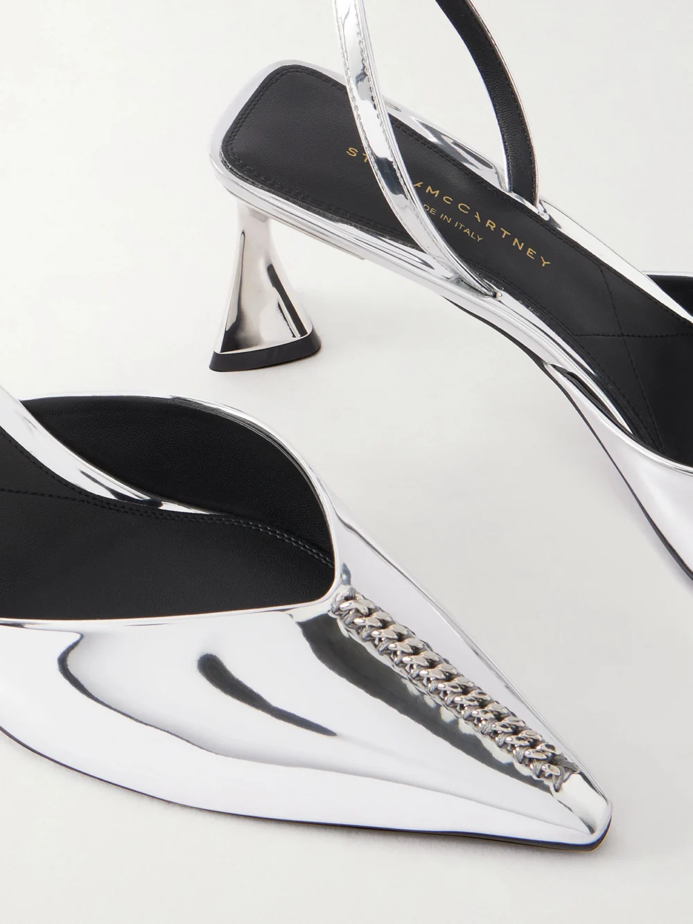 Close-up detail of the Stella McCartney Elsa Embellished Metallic Slingback Pumps