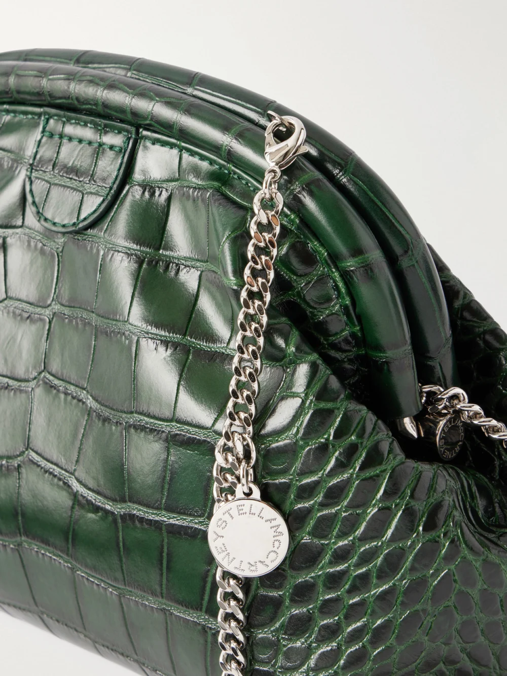 Close-up detail of the Stella McCartney Falabella Croc-effect Vegetarian Material Clutch