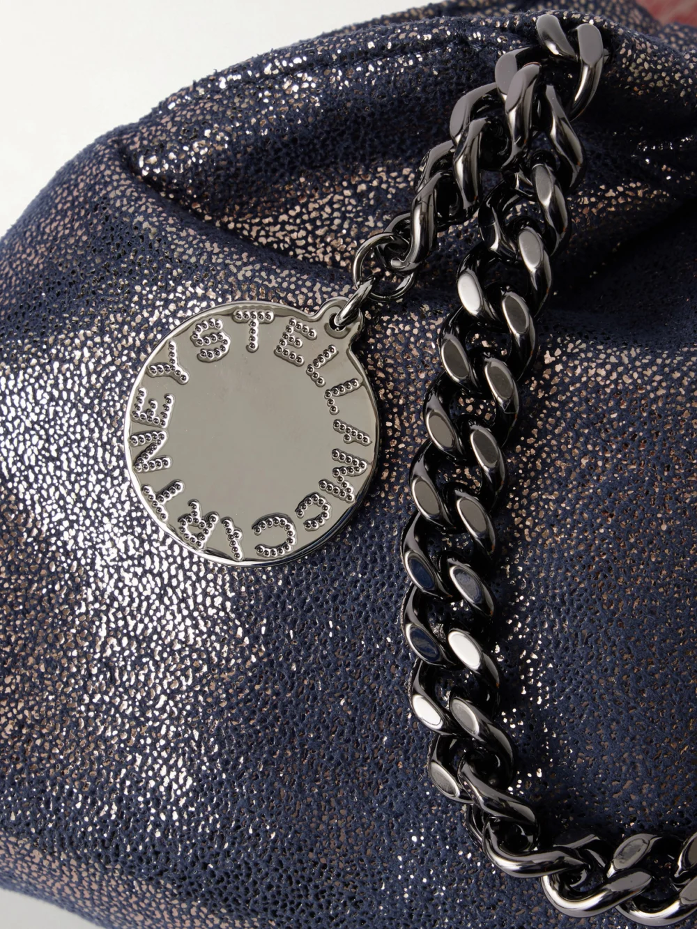 Close-up detail of the Stella McCartney Falabella Mini Metallic Vegetarian Material Top Handle Bag