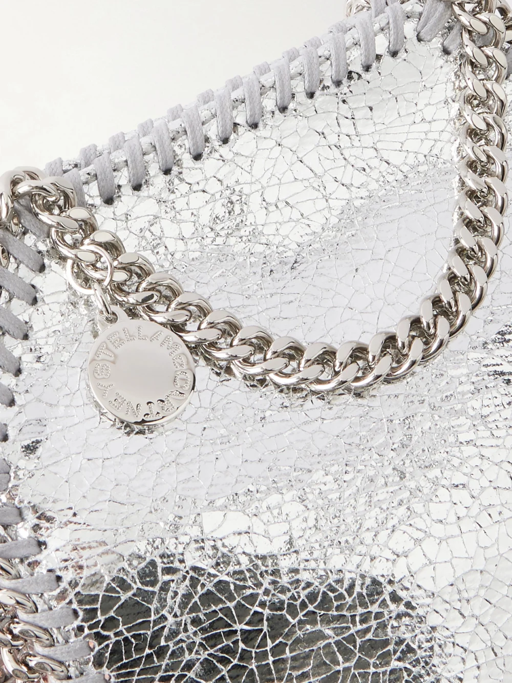Close-up detail of the Stella McCartney Falabella Tiny Crinkled Metallic Shoulder Bag