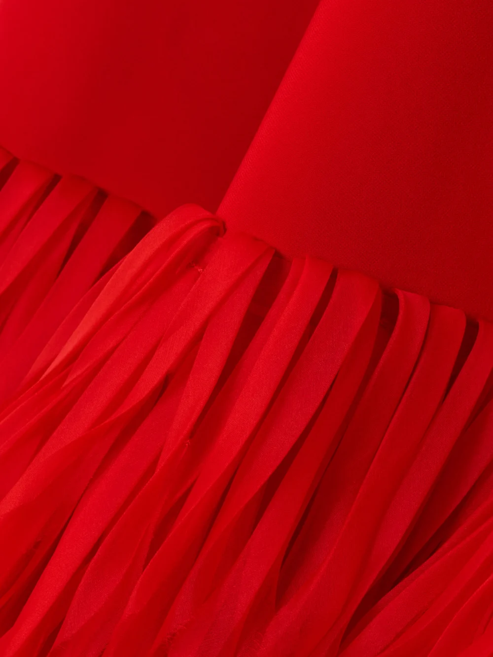 Close-up detail of the Stella McCartney Fringed Organza-trimmed Crepe Midi Dress