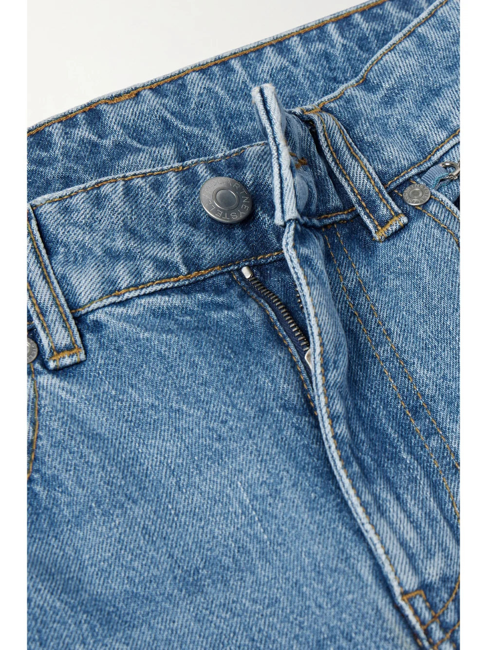 Close-up detail of the Stella McCartney Iconic Chain-embellished High-rise Flared Jeans