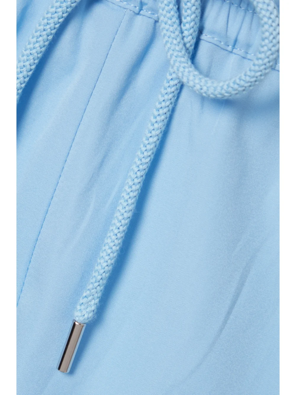 Close-up detail of the Stella McCartney Kara Paneled Organic Cotton-ripstop and Shell Track Pants