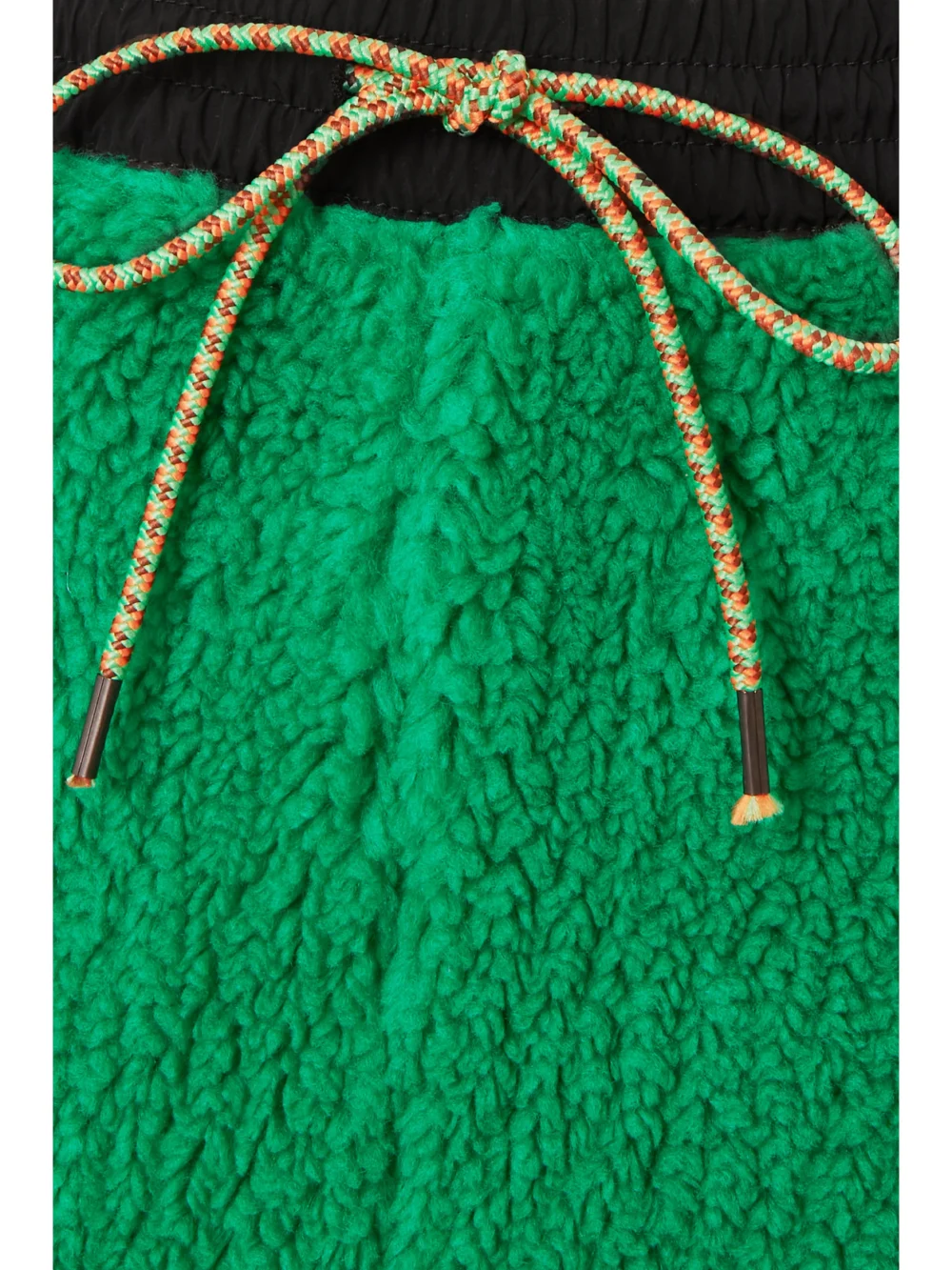 Close-up detail of the Stella McCartney Kara Recycled Faux Shearling and Shell Track Pants
