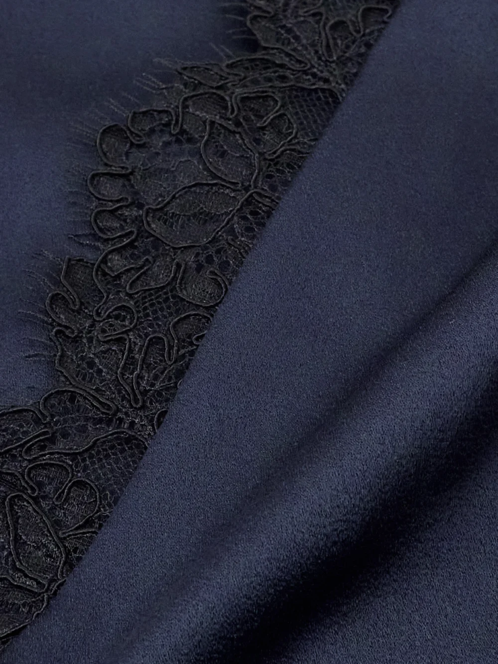 Close-up detail of the Stella McCartney Lace-trimmed Satin Midi Dress