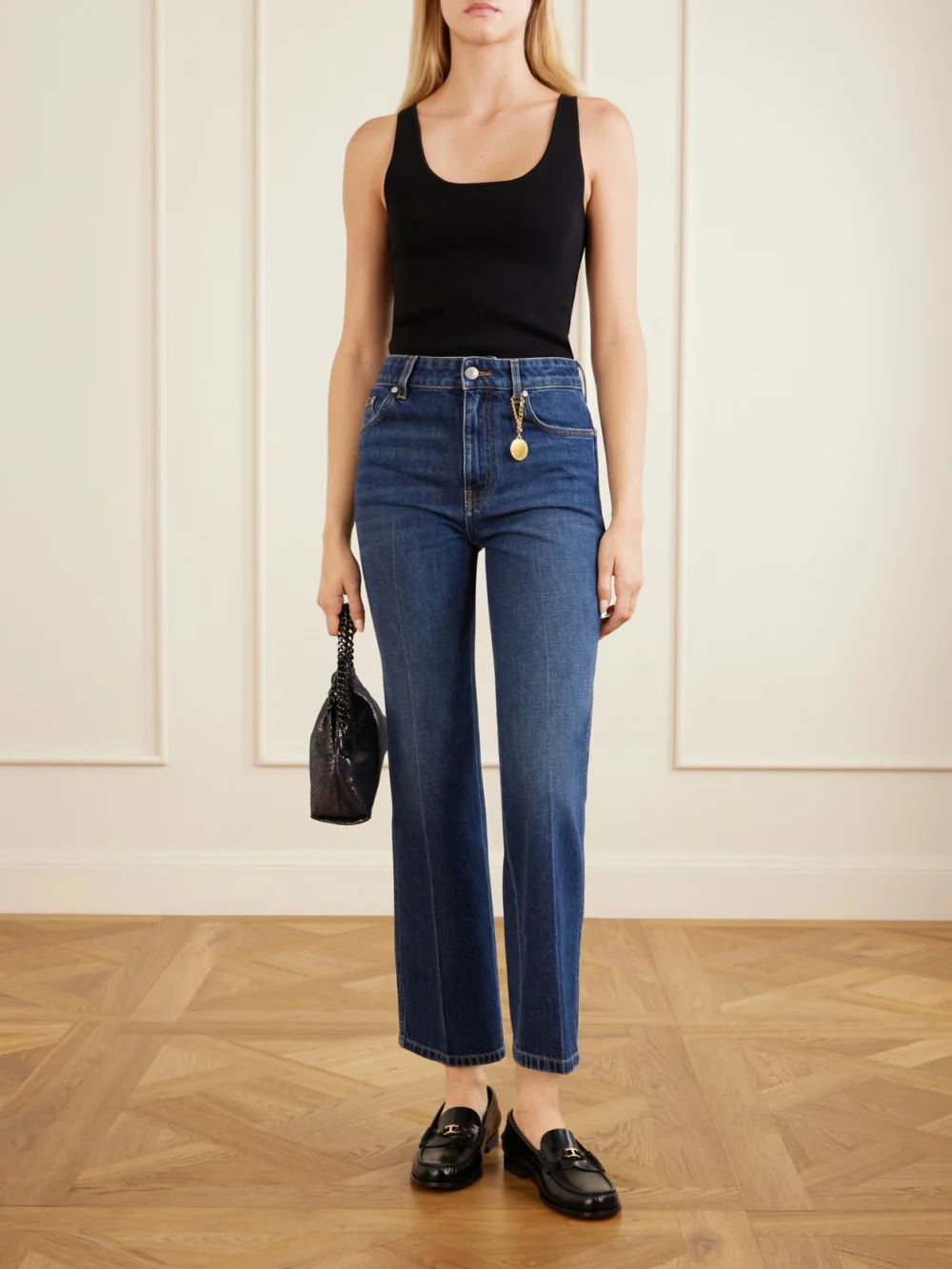 Stella McCartney Mid-rise Cropped Flared Jeans, worn by a model