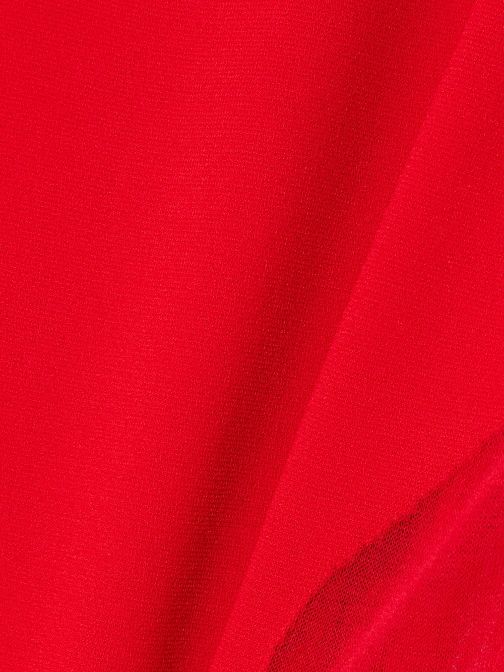 Close-up detail of the Stella McCartney Miracle Paneled Knitted Midi Dress