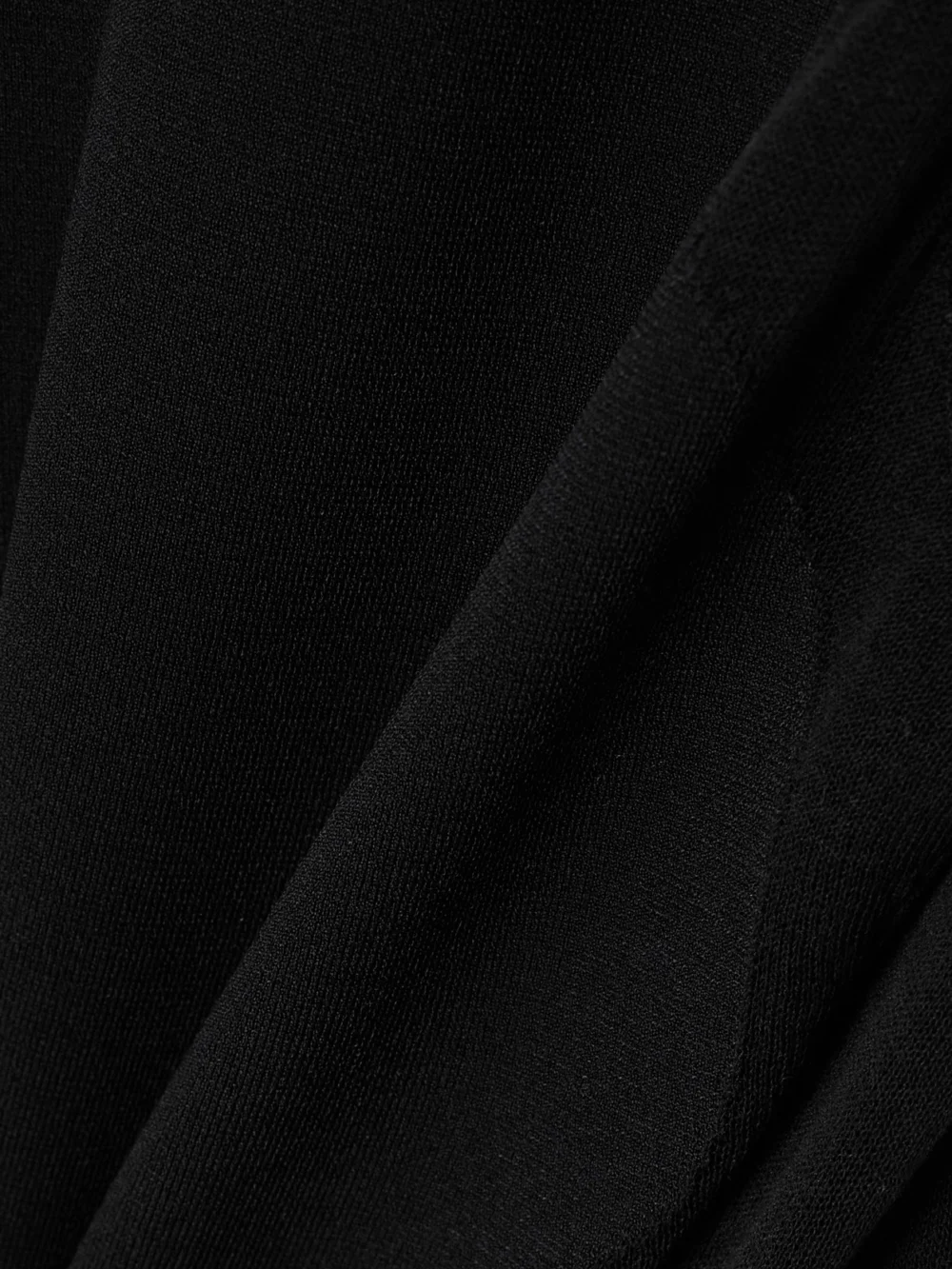 Close-up detail of the Stella McCartney Miracle Paneled Stretch-knit Mini Dress