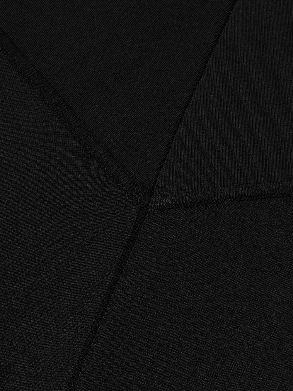 Close-up detail of the Stella McCartney Off-the-shoulder Knitted Dress