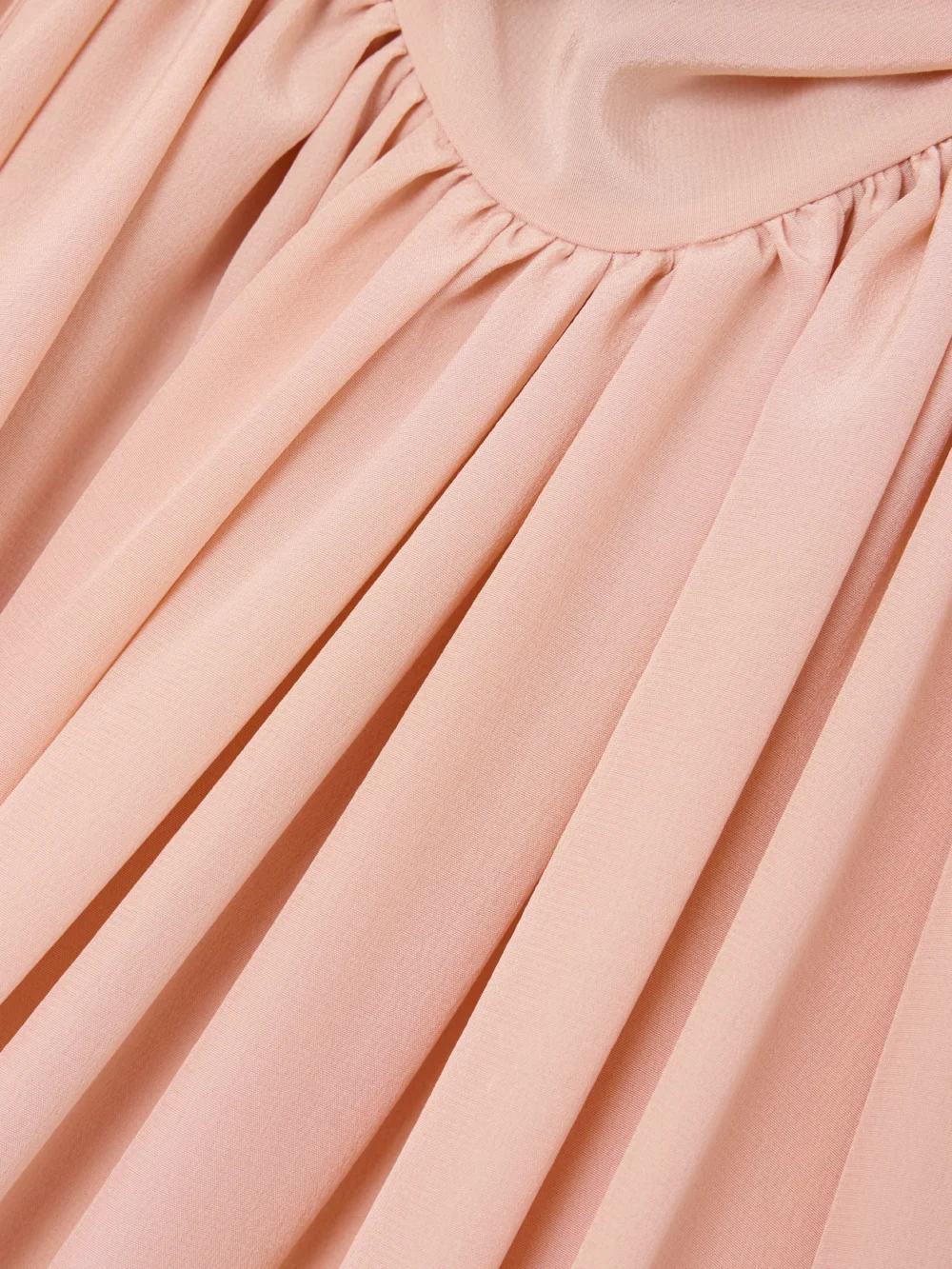 Close-up detail of the Stella McCartney Open-back Gathered Silk Crepe De Chine Mini Dress
