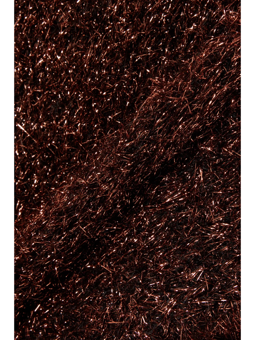 Close-up detail of the Stella McCartney Oversized Cutout Metallic Knitted Sweater