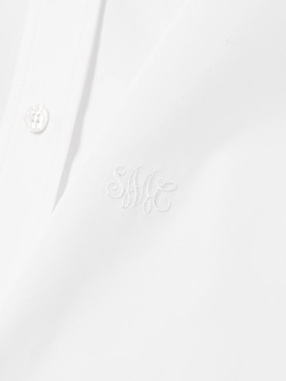 Close-up detail of the Stella McCartney Oversized Organic Cotton-poplin Mini Shirt Dress