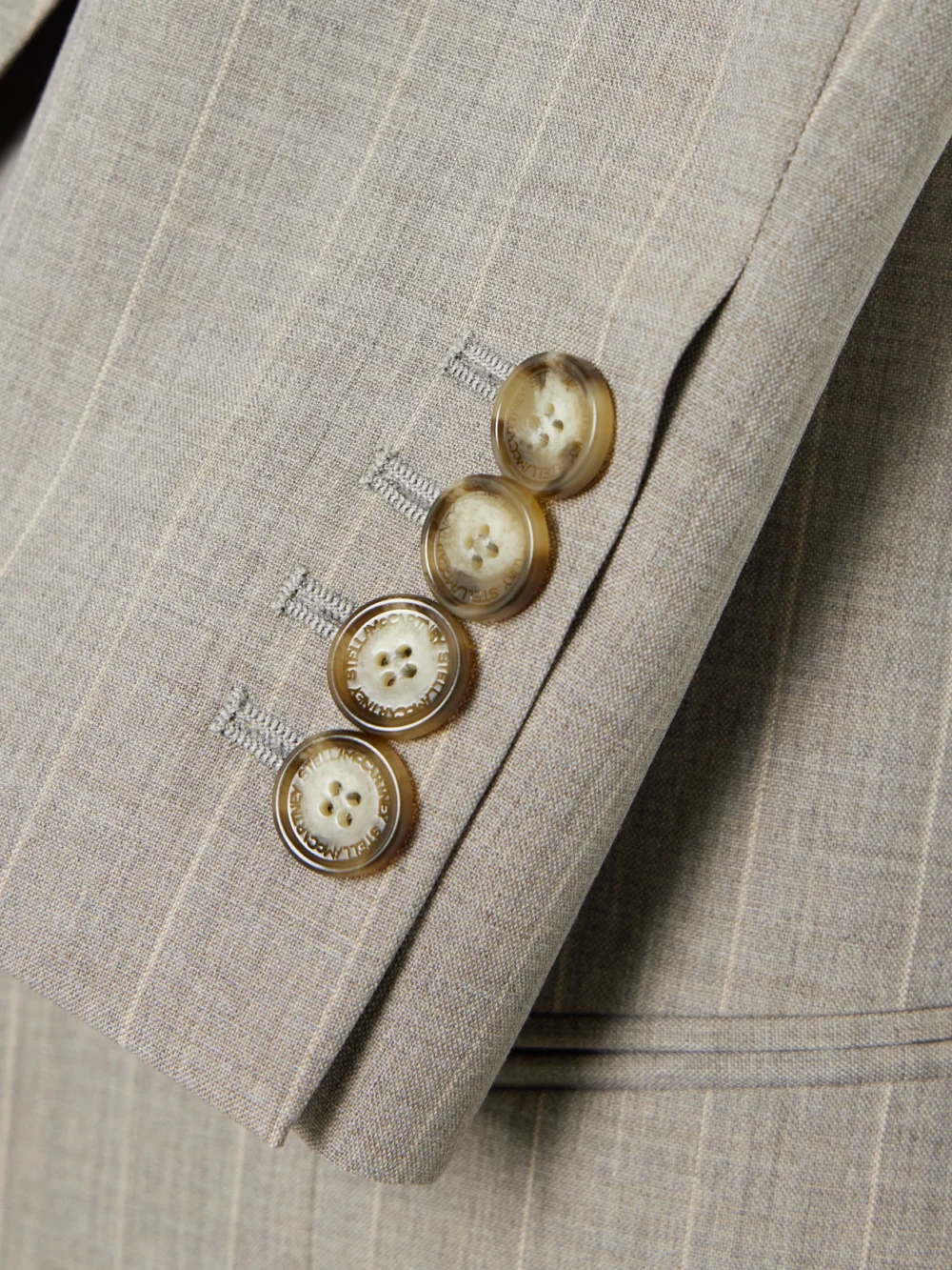 Close-up detail of the Stella McCartney Pinstriped Wool Blazer